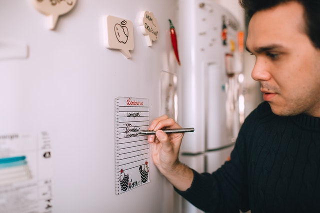 Aloha at Home - Dad schedules in his self care on a reminder on the refrigerator